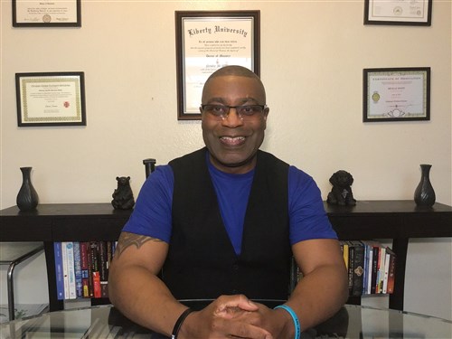 Dr. Neville M. White PhD, MDiv, MEd